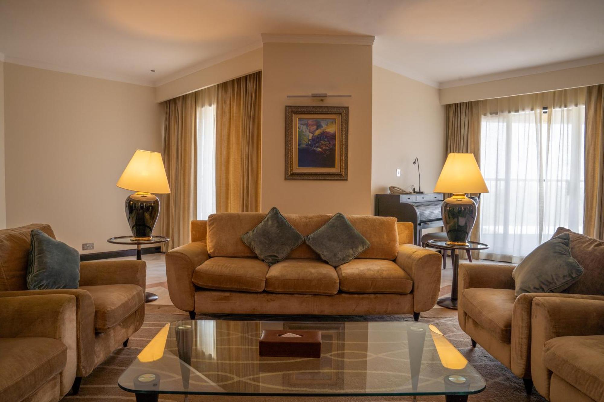 Danat Al Ain Resort Ngoại thất bức ảnh A living room in a suite at the hotel