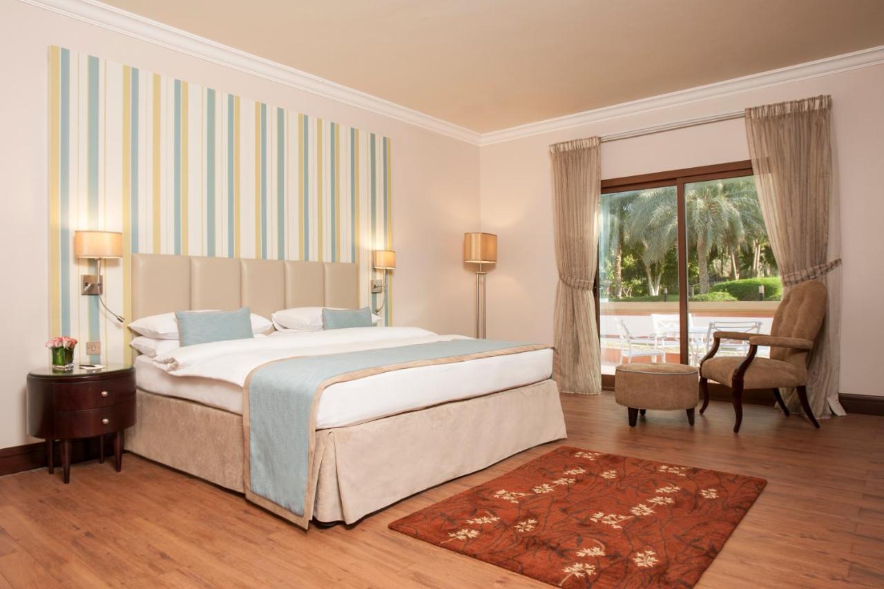 Danat Al Ain Resort Ngoại thất bức ảnh A bedroom at the hotel